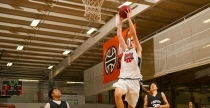 Wyatt Wilkes dunks the basketball