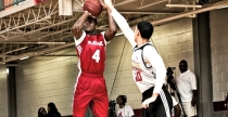 Darius Allen shoots the basketballball