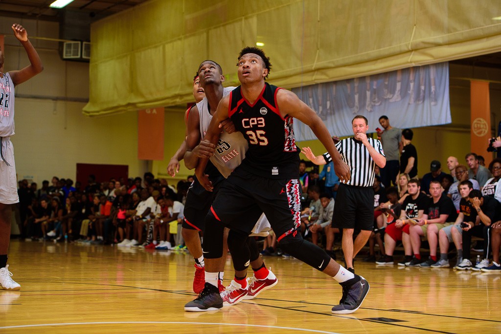 Wendell Carter and DeAndre Ayton battle it out at the Atlanta stop of the Nike EYBL circuit. PHOTO: Ty Freeman