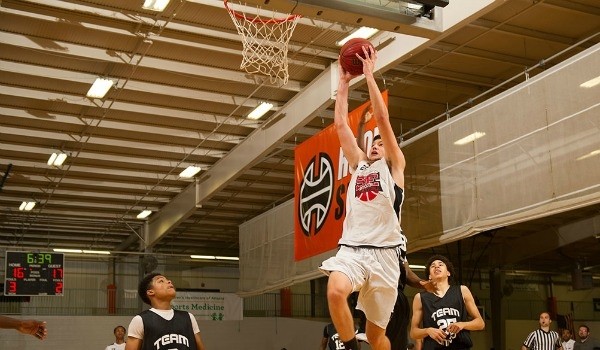 Wyatt Wilkes dunks the basketball