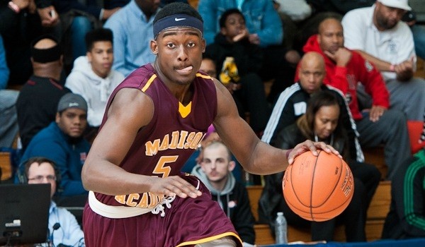 Josh Langford dribbles the basketball